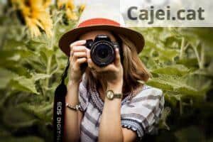 Selective Focus Photography of Woman Holding Dslr Camera
