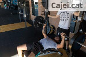 Man Lying While Doing Barbell